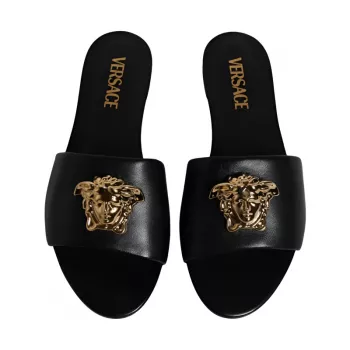 Versace Black Leather Slip-On Sandals: Gold Logo Plaque